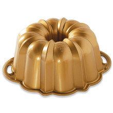 Cast aluminum bundt pan with intricate fluted design and scalloped edges, silver finish