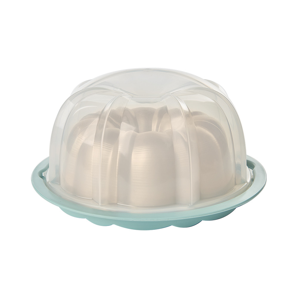 Nordic Ware golden aluminum bundt pan with translucent sea glass dome lid cover, fluted tube design