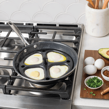 GIF showing steps for how to use Egg Poacher Insert on the stovetop inside a 10" Skillet