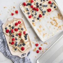 Colorful yogurt bark with berries and nuts on Nordic Ware aluminum Prism quarter sheet pan