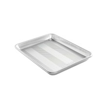 Nordic Ware Prism Quarter Sheet aluminum baking pan with textured bottom, rectangular with raised rim