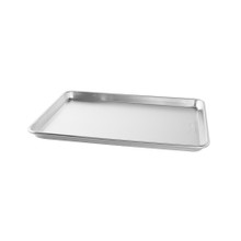 Nordic Ware aluminum half sheet pan, rectangular with raised rim, natural silver finish shown at angle