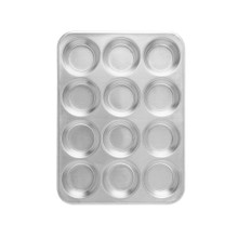 Nordic Ware Naturals aluminum 12-cup muffin pan, light gold finish with rounded cavities in 3x4 grid