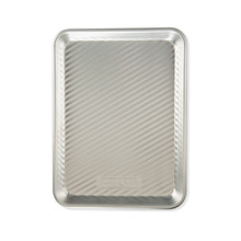 Nordic Ware aluminum rectangular grill tray with diagonal raised ridges, natural silver finish