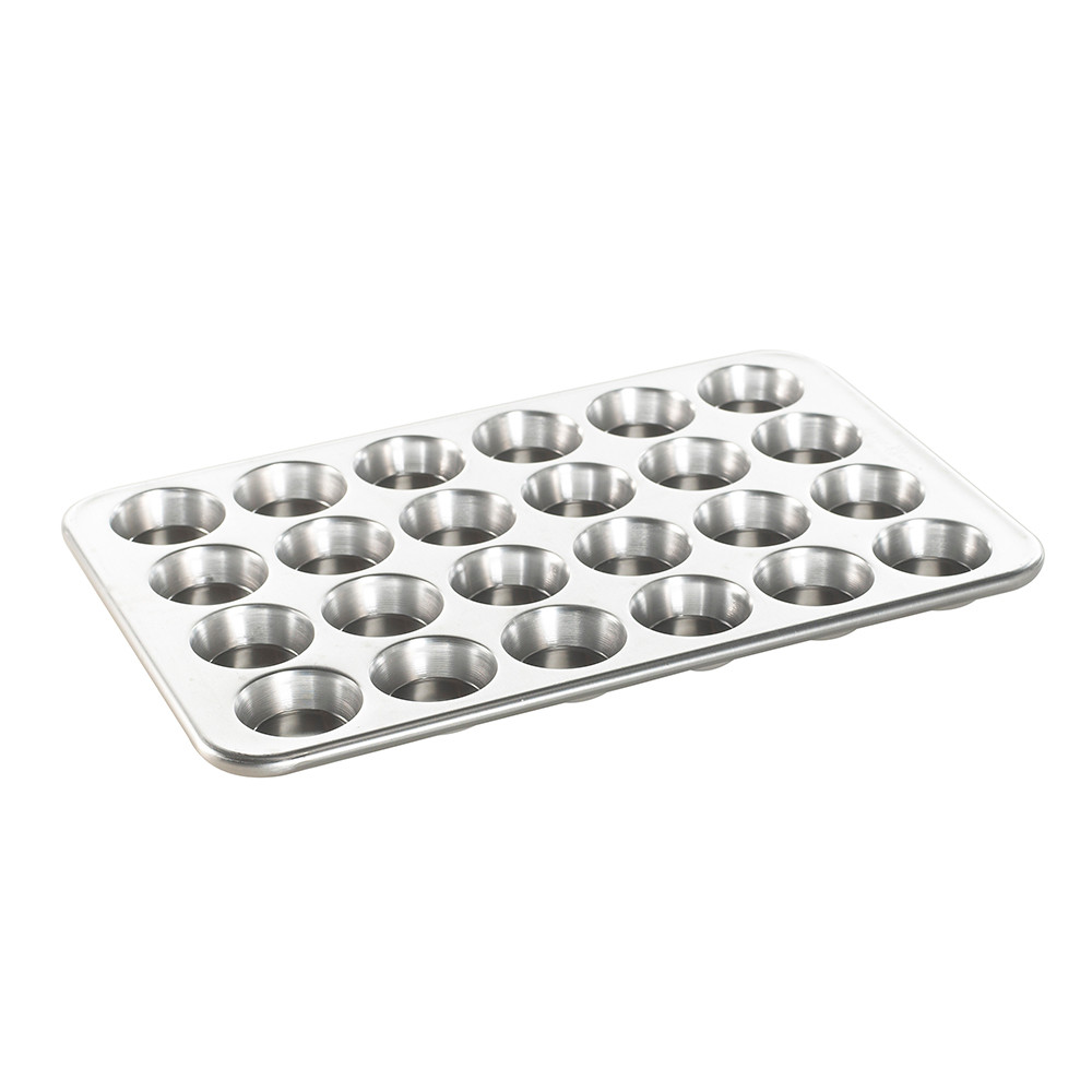 Nordic Ware natural aluminum petite muffin pan with 24 mini cavities, rectangular shape, light silver finish
