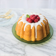 Nordic Ware aluminum 6-cup Anniversary bundt pan with fluted design, filled with baked fruit cake