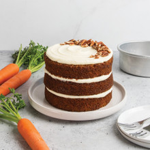 three layer frosted carrot cake baked with nordic ware 6in round layer cake pan