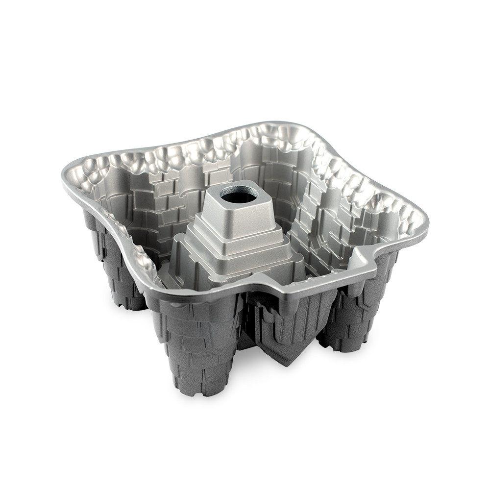 Nordic Ware Castle Bundt pan interior view showing detailed castle turret design in dark graphite nonstick finish