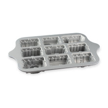 Nordic Ware aluminum train cake pan interior view, detailed locomotive compartments with non-stick surface