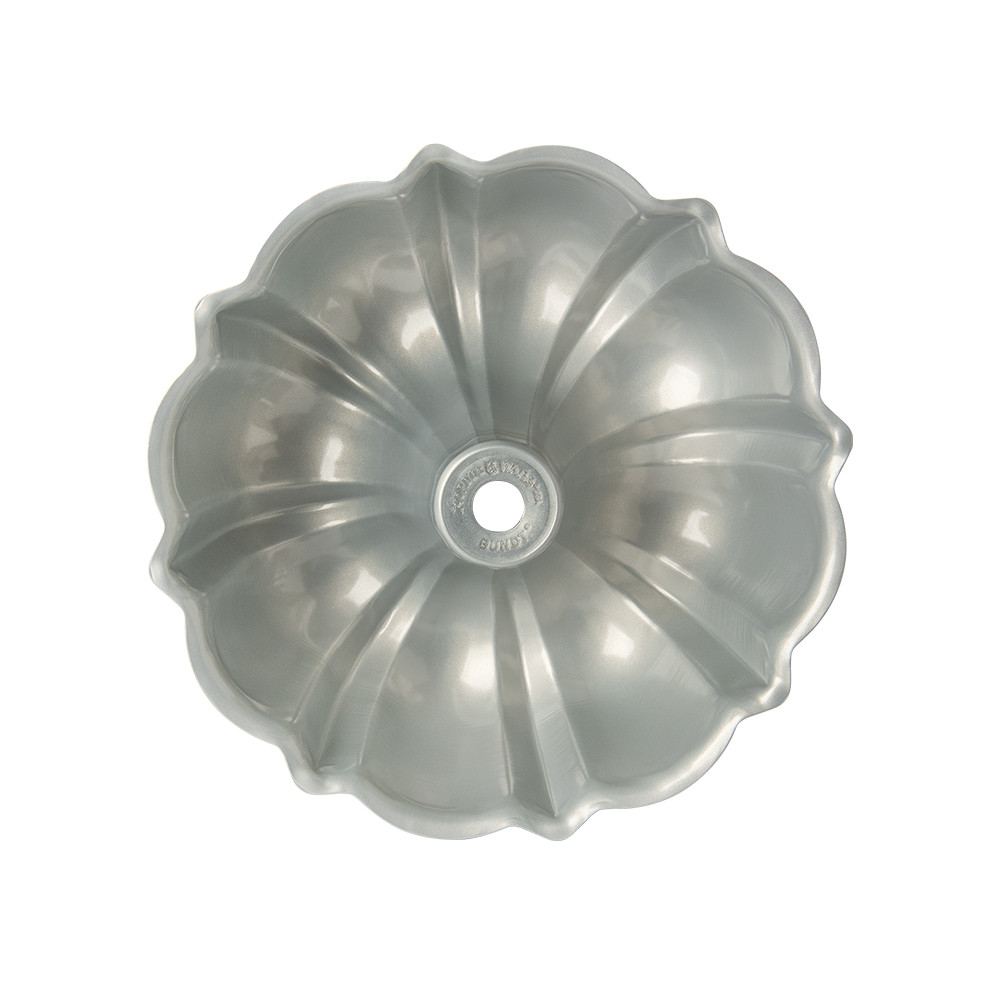 Nordic Ware aluminum bundt pan with classic fluted design, silver interior, 12-cup capacity