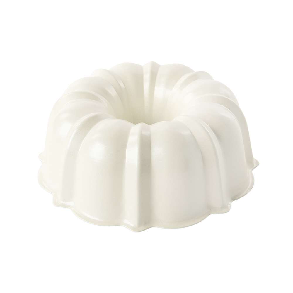 Nordic Ware aluminum bundt baking pan in glacier white, 12-cup capacity with classic fluted design