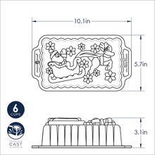 Technical dimensional drawing of Nordic Ware Santa's Sleigh aluminum loaf pan showing measurements and sleigh details