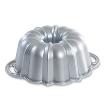 Nordic Ware 6-cup cast aluminum bundt pan with fluted design, silver finish on white background