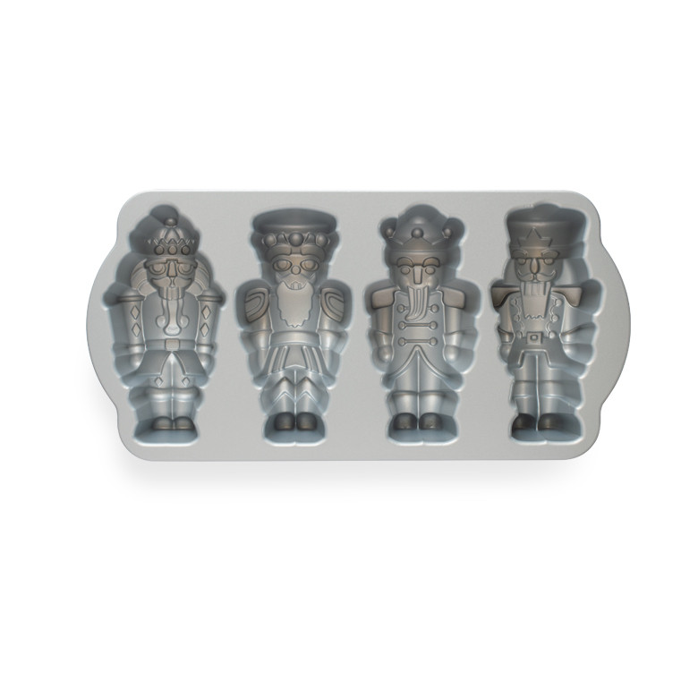 Nordic Ware aluminum cakelet pan with 4 nutcracker soldier cavities, detailed 3D molds, silver interior