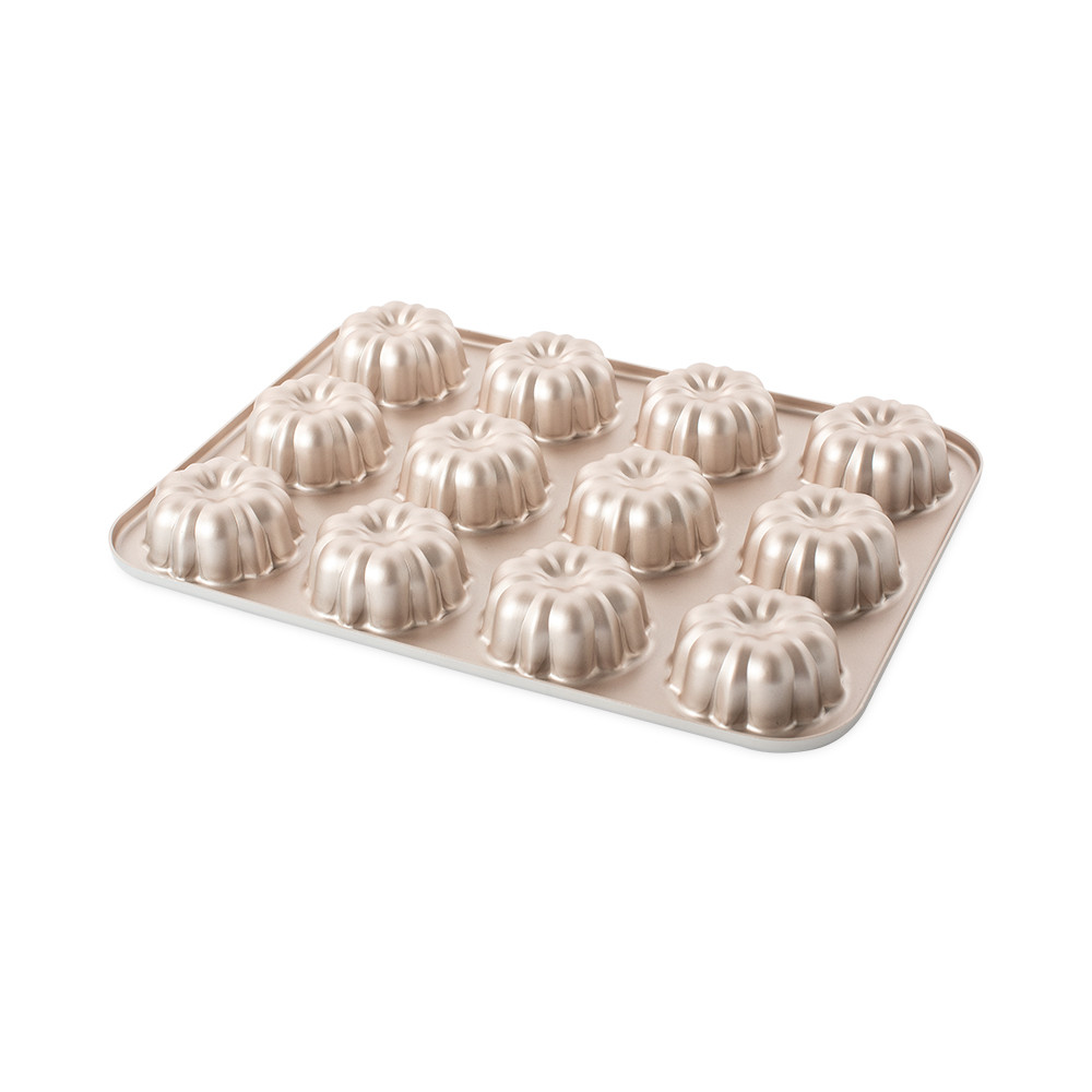 Nordic Ware aluminum mini bundt cupcake pan with 12 fluted cavities, golden finish