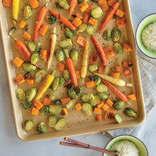 Roasted Brussels sprouts, carrots and sweet potatoes on Nordic Ware nonstick sheet pan, golden brown finish