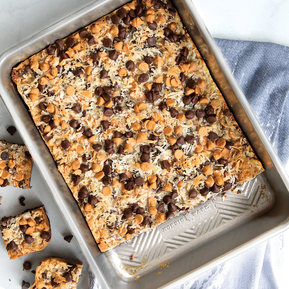Golden brown chocolate chip bars baked in Nordic Ware Prism 9x13 rectangular pan with geometric textured bottom