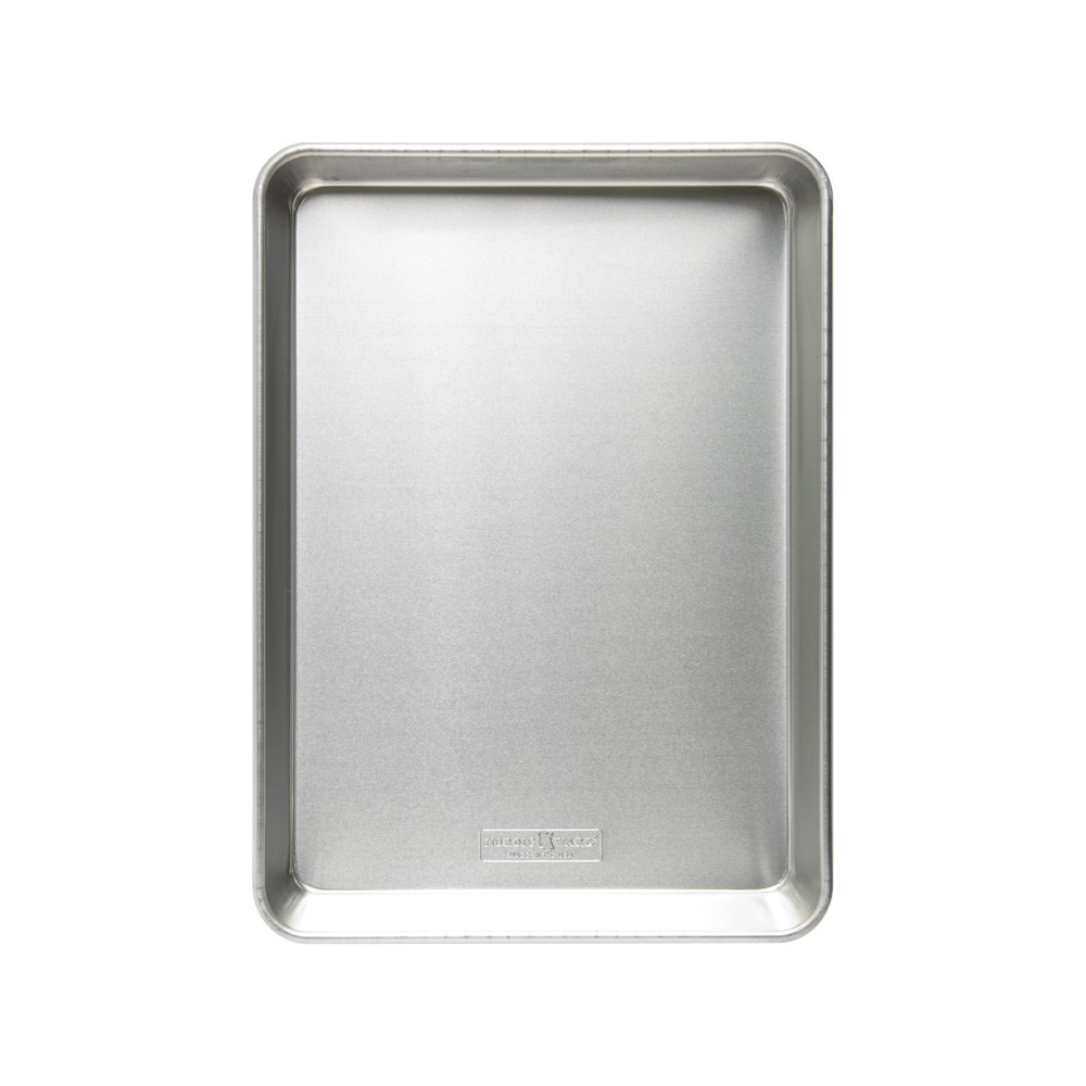 Nordic Ware aluminum high-sided sheet cake pan, rectangular with tall raised rim, natural silver finish