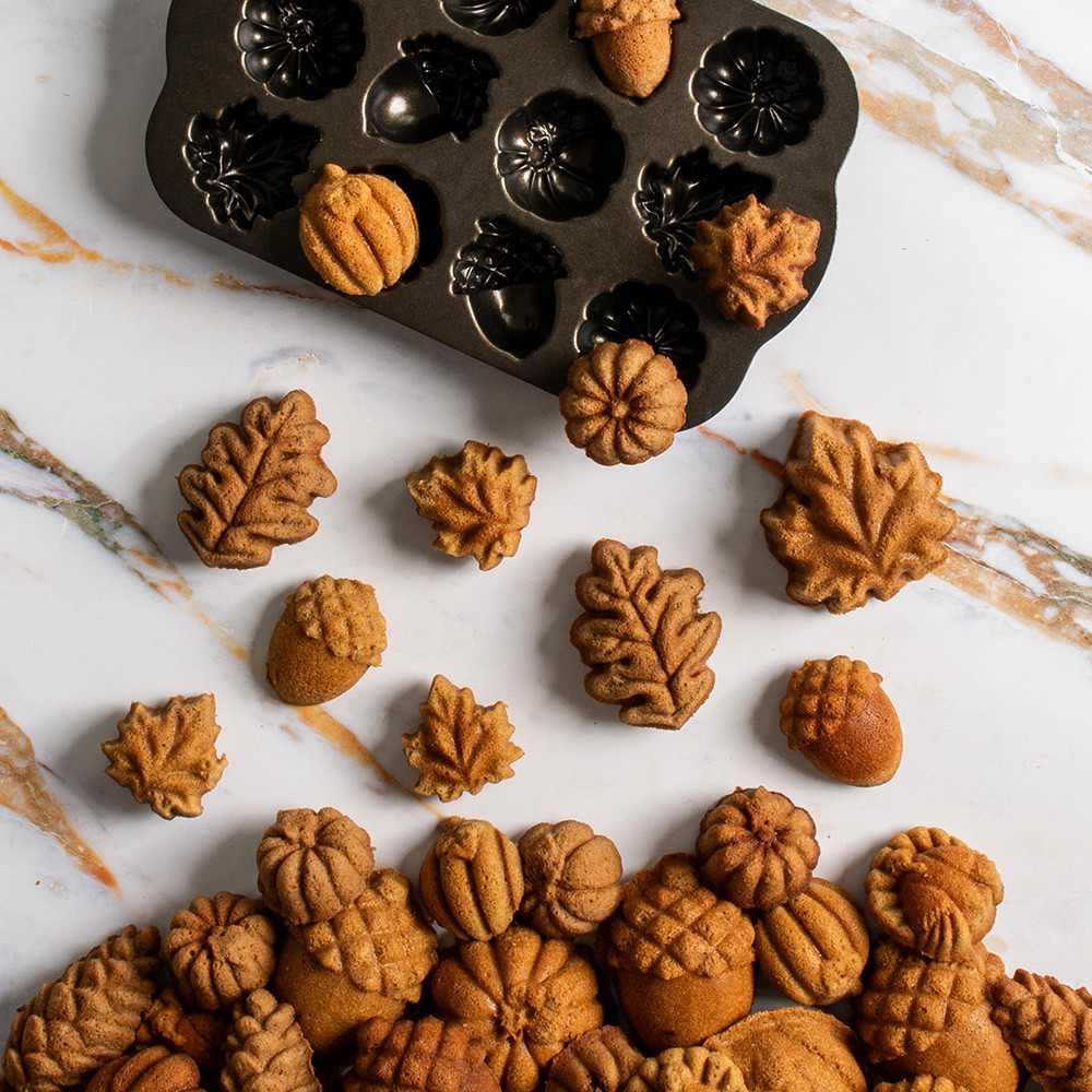 Overhead image of Autumn Cakelets arranged to be falling out of pan into a pile