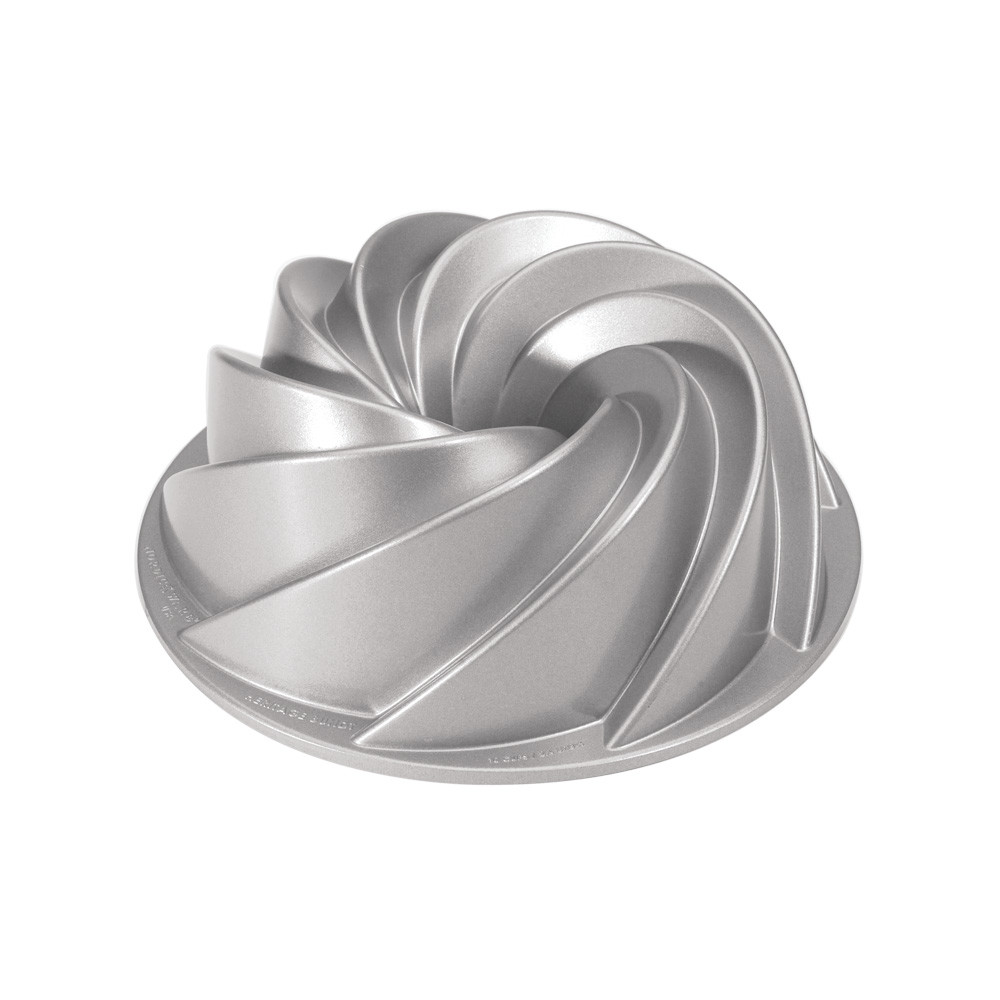 Nordic Ware Heritage bundt pan, aluminum with elegant swirled fluted design, metallic silver finish