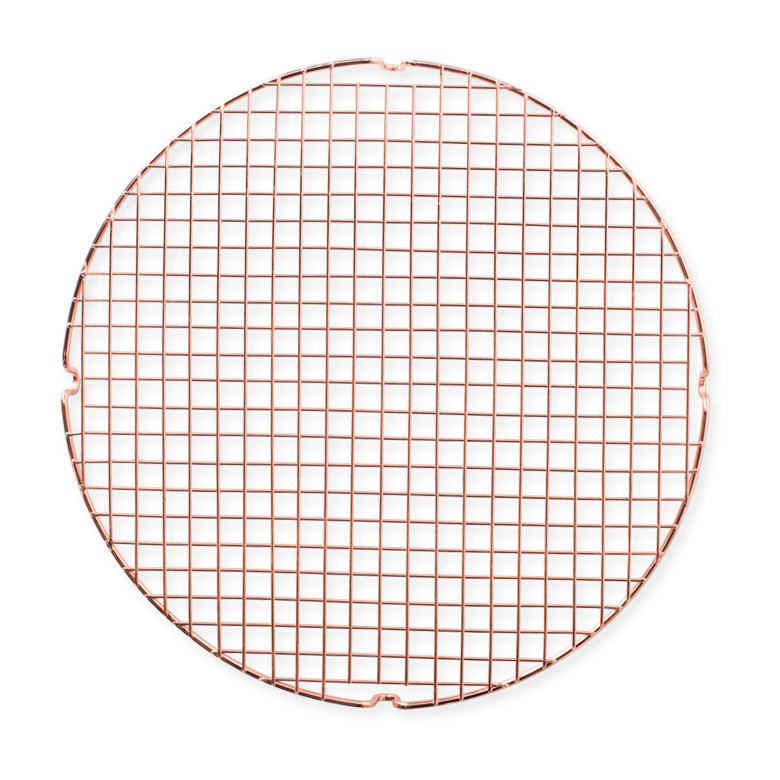 Nordic Ware round copper cooling rack with wire grid pattern and raised feet for air circulation
