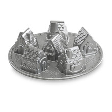 Nordic Ware aluminum Cozy Village baking pan with detailed house-shaped cavities, silver finish