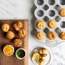 Golden baked popovers in Nordic Ware aluminum petite popover pan