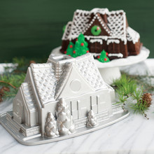 Nordic Ware aluminum gingerbread house bundt pan with intricate architectural details, silver finish
