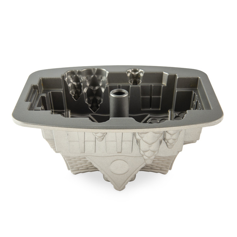 Nordic Ware aluminum Gingerbread House Bundt pan interior showing detailed house-shaped cavity with nonstick coating