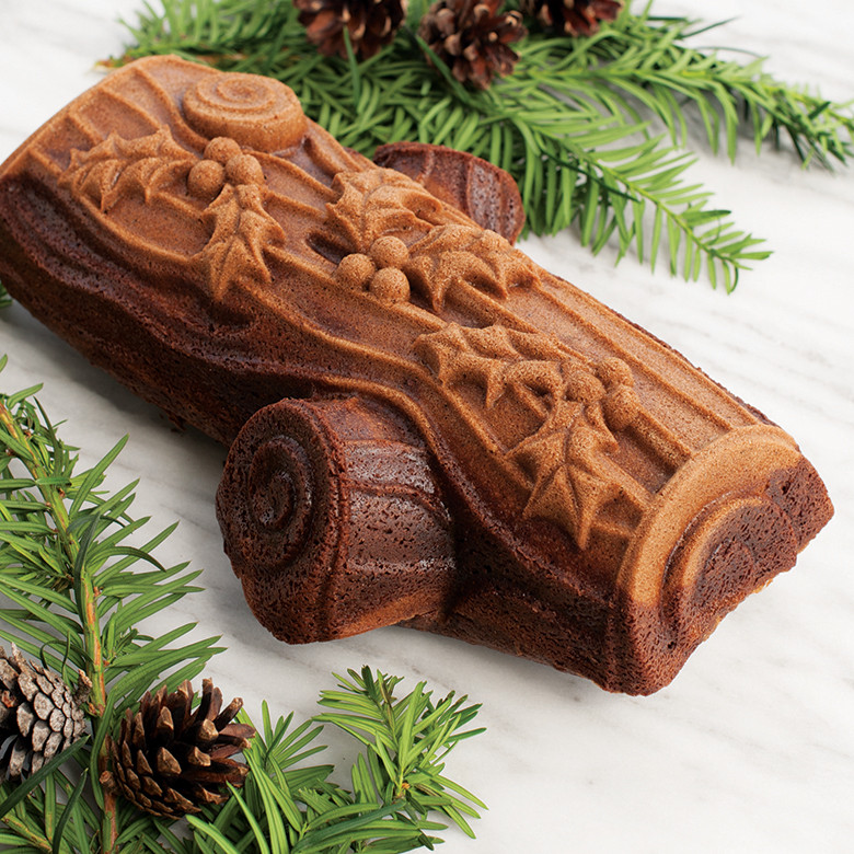 Nordic Ware aluminum Yule log baking pan with ridged bark texture design, natural silver finish