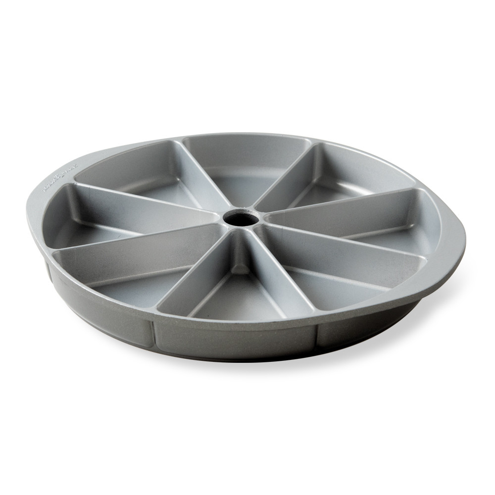 Nordic Ware aluminum scone and cornbread baking pan with 8 triangular wedge-shaped cavities, natural silver finish
