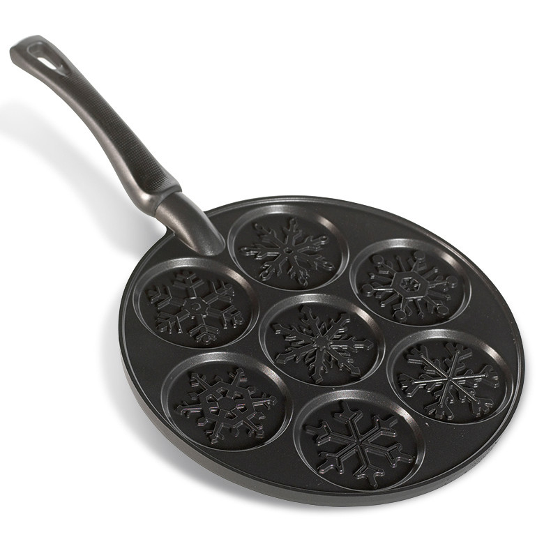 Nordic Ware aluminum pancake pan with six snowflake-shaped wells, cast aluminum construction, natural finish