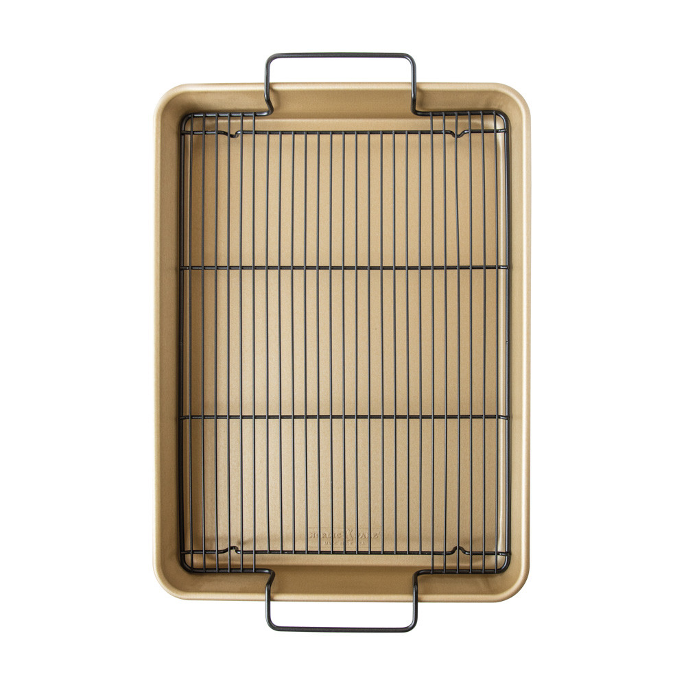 Nordic Ware nonstick rectangular baking tray with high raised sides, light colored interior finish