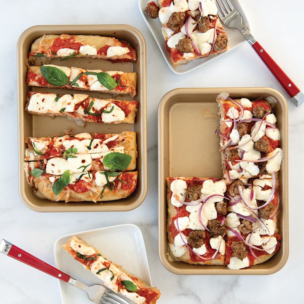 Nordic Ware aluminum eighth sheet pan with golden-brown baked chicken parmesan, non-stick surface
