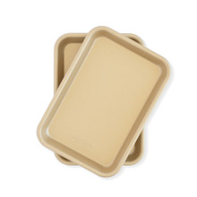 Two Nordic Ware aluminum eighth sheet pans stacked, natural silver finish with nonstick coating