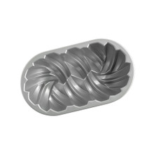 Nordic Ware aluminum braided loaf pan with decorative woven pattern design and silver nonstick interior