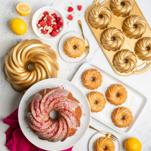 Golden swirl bundt cake and cakelettes baked in Nordic Ware aluminum swirl bundt and buntlette pans
