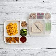 Nordic Ware divided dinner tray with lid, showing kids meal portions being transferred between compartments