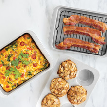 Nordic Ware aluminum 5-piece bakeware set with natural finish, including sheet pans and cooling racks