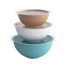 Nordic Ware white ceramic 6-piece covered bowl set stacked in graduated sizes with fitted lids
