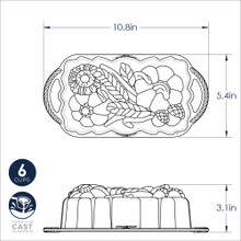Nordic Ware aluminum sunflower and pumpkin loaf pan technical drawing showing dimensions and decorative design