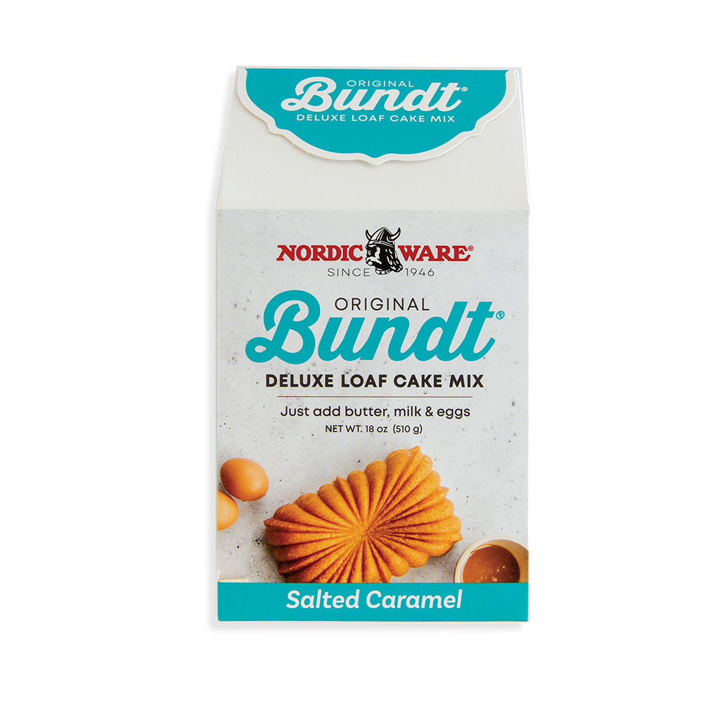 Nordic Ware fluted loaf pan with salted caramel quick bread mix box, showing golden-brown baked loaf