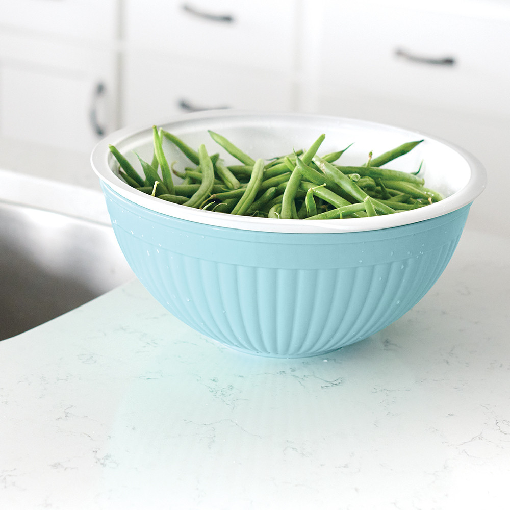 Nordic Ware white plastic colander nested in matching bowl, filled with fresh green beans