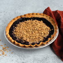 Baked blueberry crumble pie in Nordic Ware aluminum 9-inch pie pan with natural silver finish