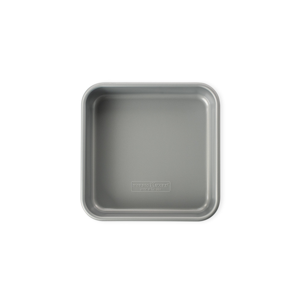 Nordic Ware aluminum square cake pan, 9-inch with straight sides and natural silver finish, overhead view