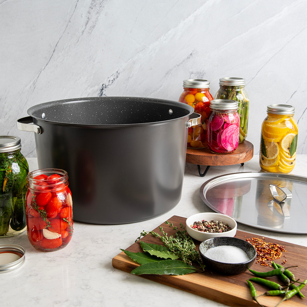 16qt Stock Pot with Lid surrounded by various jars of vegetables