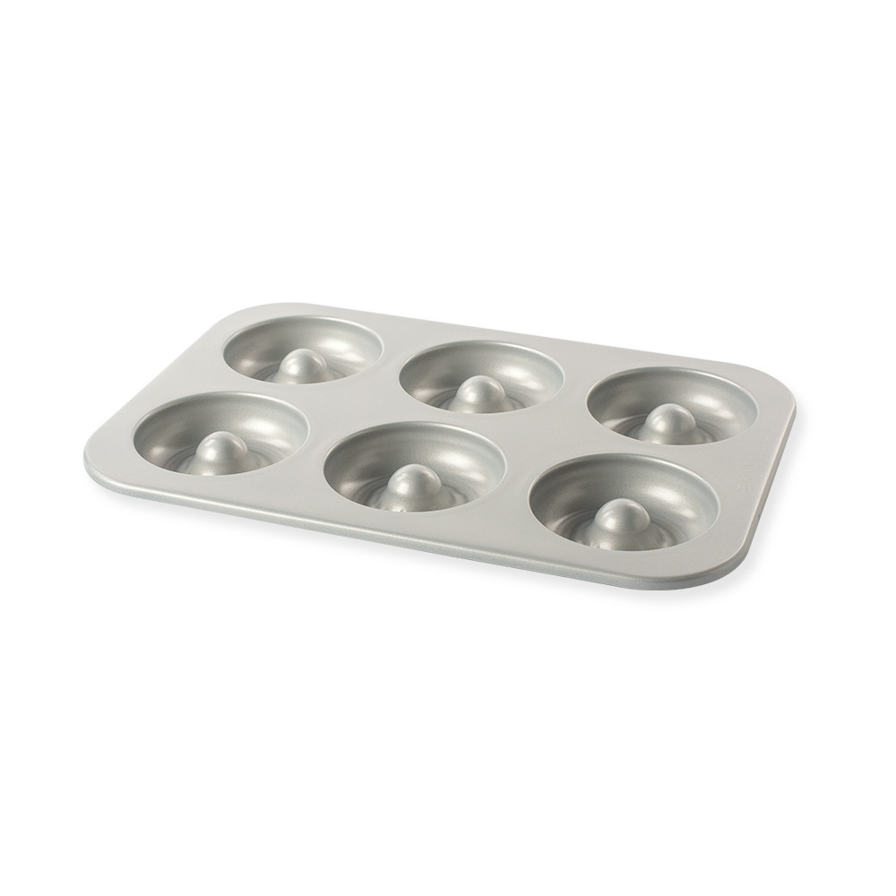 Nordic Ware aluminum donut pan with 12 cavities, red exterior and silver non-stick interior