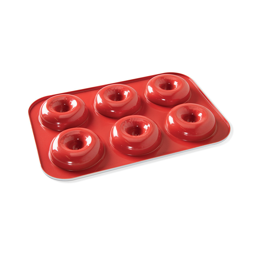 Nordic Ware red aluminum donut pan with 6 round cavities, non-stick coating, rectangular shape