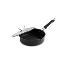 Nordic Ware Verde 8-inch ceramic nonstick skillet with glass lid, dark green exterior, angled view