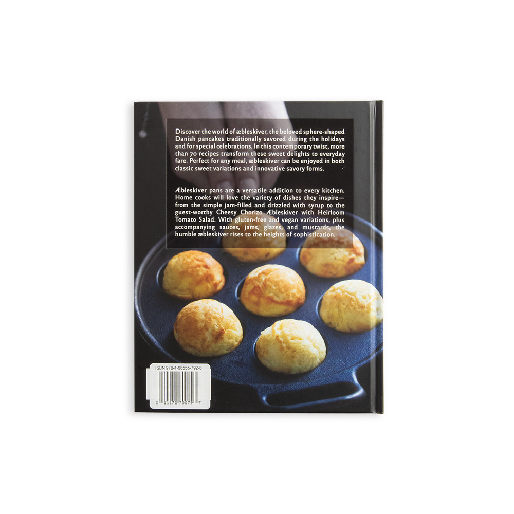 Nordic Ware Aebleskiver cookbook back cover and cast aluminum Danish Ebelskiver pan with seven round wells